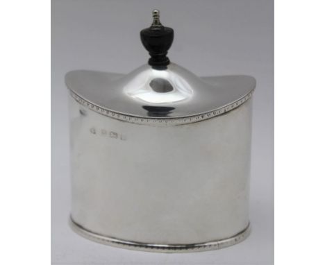 WILLIAM AITKEN, A GEORGIAN DESIGN SILVER TEA CADDY, oval form with hinged cover having ebonised wood knop handle, Birmingham 