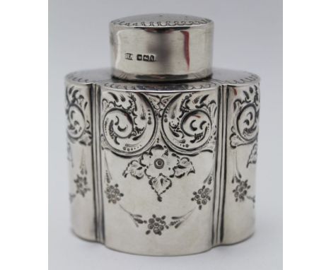 ATKIN BROTHERS, A LATE VICTORIAN SILVER TEA CADDY, lobed form with embossed floral decoration, Sheffield 1900, 7cm high, weig