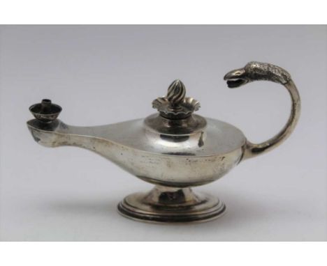 A LATE VICTORIAN SILVER ALADDINS LAMP DESIGN TABLE CIGAR LIGHTER, mask terminal scroll handle, London 1897, weight; 129g 