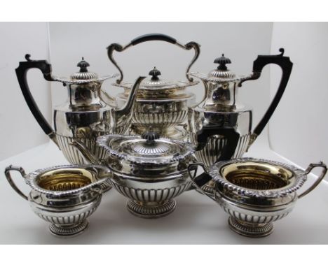 ELKINGTON &amp; CO. A SILVER SIX PIECE TEA AND COFFEE SERVICE of Georgian design, anthemian and acanthus leaf rims, half flut