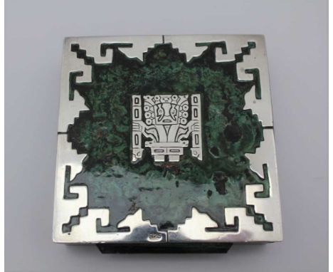 AN ORNATE SQUARE BOX green enamel on copper with inlaid .925 silver in the Aztec style, lined with box wood, 9.5cm x 2.5cm hi