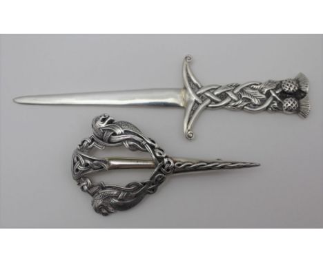 JOHN HART, A SCOTTISH SILVER PAPER KNIFE, with cast thistle handle, Glasgow 1959, 13.5cm long, together with A CELTIC DESIGN 