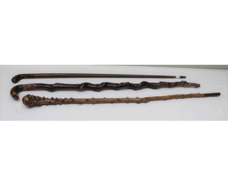 A LATE 19TH CENTURY BRIAR COURT ROOT WOOD WALKING STICK, together with a twisted shaft walking stick, and one other (3) 