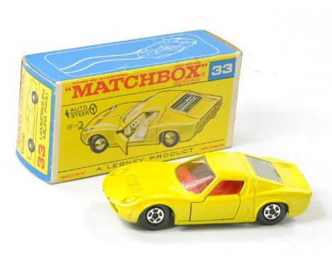 Matchbox Superfast No. 33a Lamborghini Miura. Yellow body, clear windows with frosted rear engine cover, red interior and bar