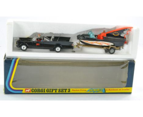 Corgi No. GS3 Batman Gift Set comprising 1) Batmobile. Black with clear windows, Batman figure, gold tow hook, grey plastic a
