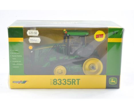 Britains Farm 1/32 issue comprising John Deere 8335RT Tractor. Excellent, secure in box and not previously removed from packa