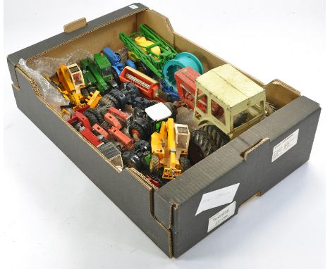 A tray of assorted Britains farm tractor and implement issues, for spares / repairs plus other diecast. 