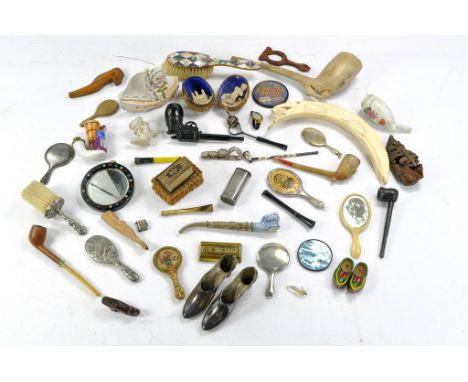 A further interesting group of vintage smoking pipes of various themes and materials, ceramic, wooden and metal in addition t