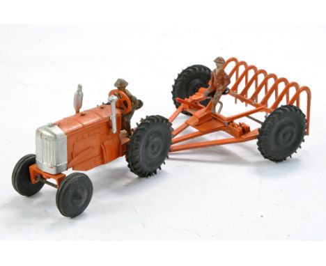 Crescent vintage tractor and rake set including figures. Orange with black wheels, silver trim. Generally excellent (especial