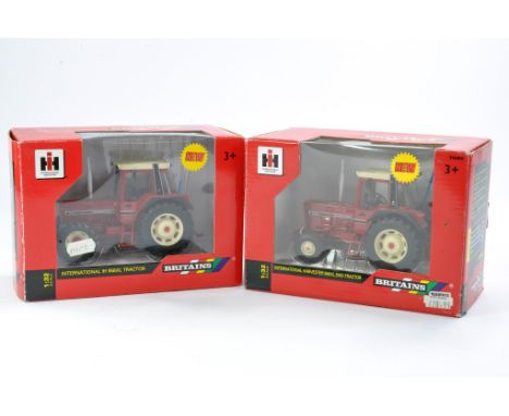 Britains 1/32 Farm issues comprising International Harvester 956XL 2WD Tractor plus 956XL 4WD. Both look to be very good to e