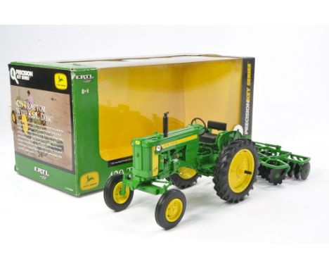 Ertl 1/16 Farm Issue comprising John Deere 420 Tractor with KBL Disc. Precision Key Series No. 4. Has been displayed but appe