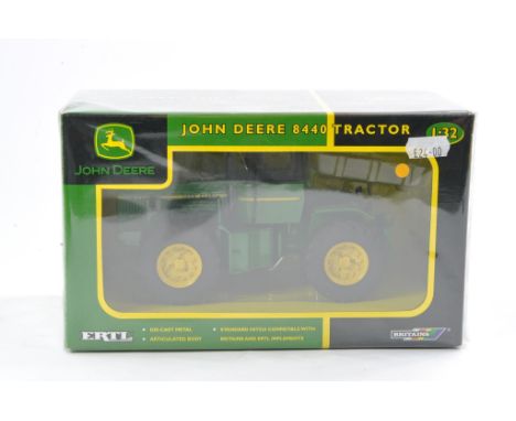Britains Farm 1/32 issue comprising John Deere 8440 Tractor. Excellent, secure in box and not previously removed from packagi