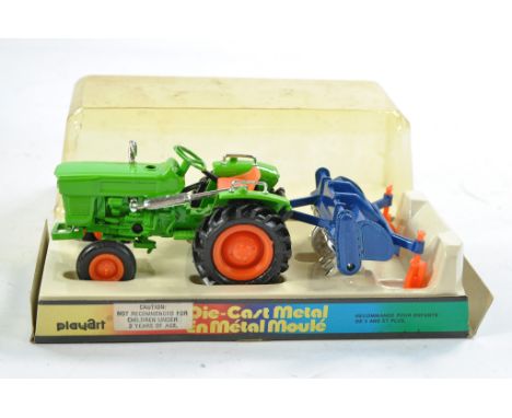 Playart No. 7942 Tractor and Implement Set. Excellent and complete in fair to good original box, UV wear to bubble. 