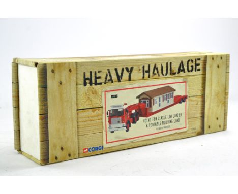 Corgi Diecast Model Truck Issue comprising No. CC13110 Volvo F88 Low Loader with Building load in the livery of Heanor. Looks