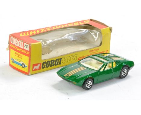 Corgi No. 203 Mangusta. Green, Gold, ivory interior. Excellent in fair box. 