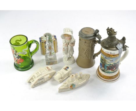An elaborate decorative German ceramic stein with pewter lid and decoration plus one other both with notable damage plus othe