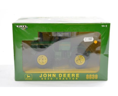 Britains Farm 1/32 issue comprising Plow City John Deere 8630 Tractor. Excellent, secure in box and not previously removed fr