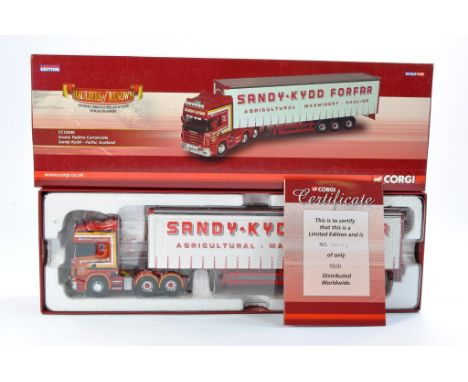 Corgi Diecast Model Truck issue comprising No. CC12940 Scania Topline Curtainside in the livery of Sandy Kydd. With Certifica