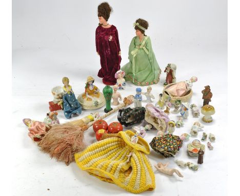 An attractive collection of ceramic / china / porcelain half dolls in various poses and sizes, some well kept without fault, 