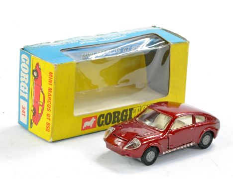 Corgi No. 341 Mini Marcos GT. Crimson with white interior. Excellent, the odd rub along a couple of edges in fair tape repair