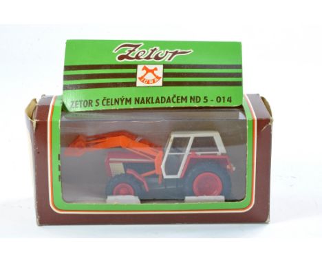 IGRA plastic farm issue comprising Zetor Crystal tractor with loader. Missing exhaust, otherwise good in good original box. 