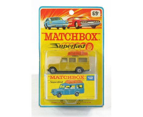 Matchbox Superfast No. 12a Safari Land Rover. Gold with light brown luggage. Excellent with excellent F Black Script type box