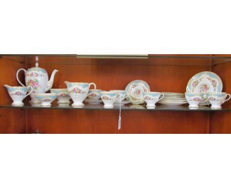 A Windsor china coffee set; six cups, saucers and plates, sugar bowl, slop bowl, cream jug and milk jug and coffee pot