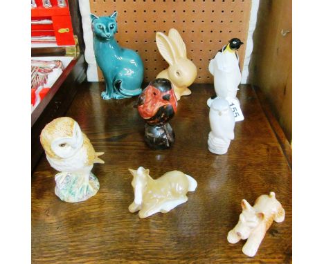 A SylvaC rabbit and small dog, Poole Pottery penguin and cat, Szeiler horse, Copenhagen owl, David Sharp robin and Beswick ow