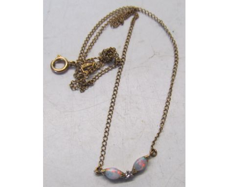 A delicate opal and diamond necklace on 9ct gold chain