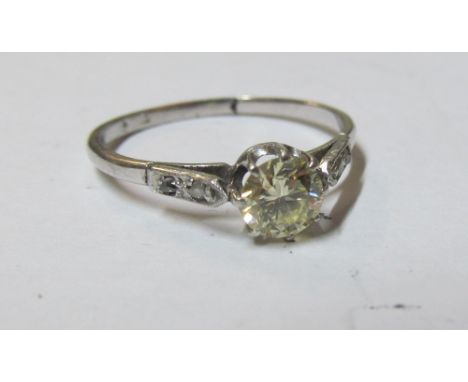 A platinum single stone diamond ring (draws yellow) (0.25-0.5ct spread) 2.7g