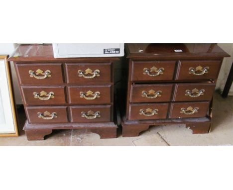 A small reproduction chest of two short and three long drawers on bracket feet and another with six small drawers