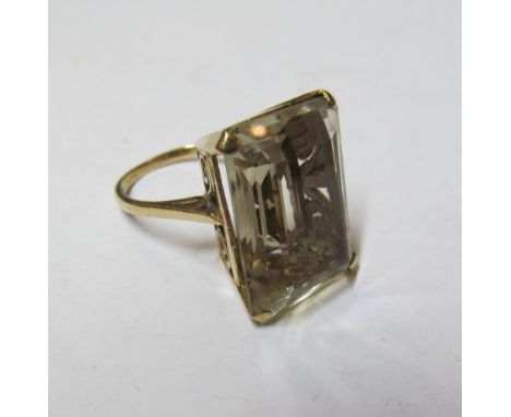 A 9ct gold ring set large yellow stone