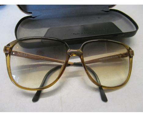 A pair of prescription glasses in Christian Dior frames