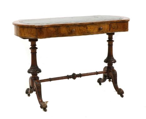 A Victorian figured walnut and boxwood strung writing table, the green leather inset top above frieze drawer on stretchered e