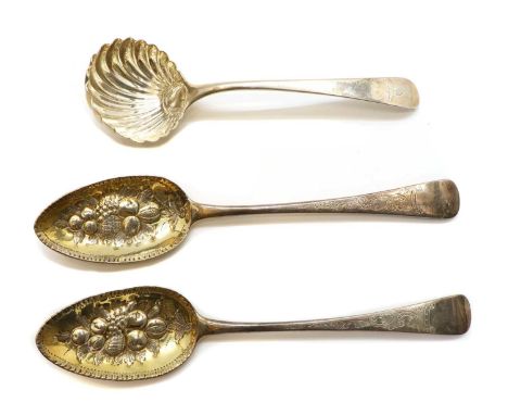 A pair of George III silver berry spoons, by William Bateman, London 1815, the gilt bowls embossed with bunches of fruit, 22.