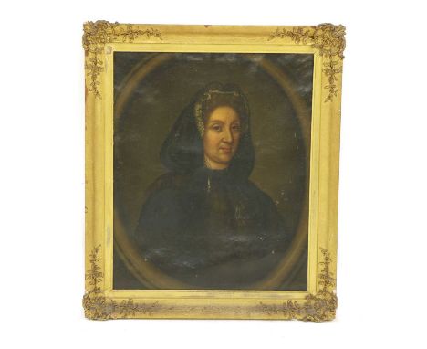 French school, late 17th centuryPortrait of a lady, bust length, in blackoil on canvas, painted oval76 x 63.5 cmCondition rep