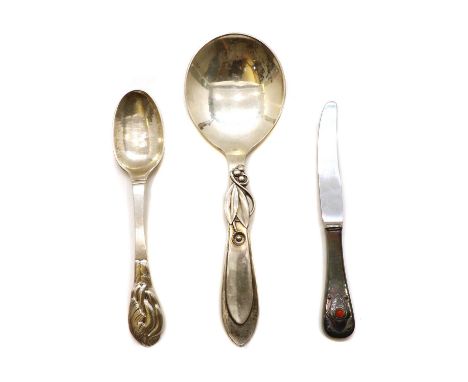 A Georg Jensen silver knife, the handle with red cabochon, signed and dated ‘1904-1979’ to the reverse, marked ‘Georg Jensen 