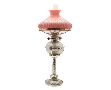 A large silver plated oil lamp by Hukin and Heath, late 19th Century, with an opaque pink glass shade over a cut glass reserv