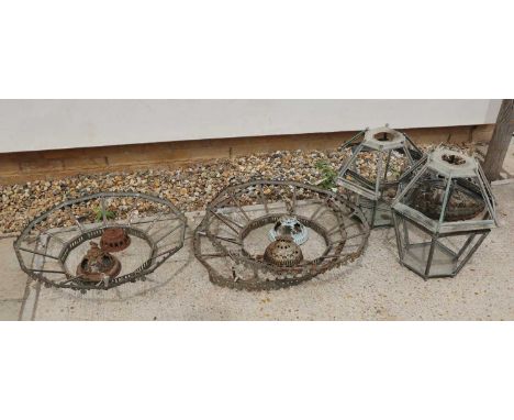 A collection of Victorian lantern frames, to include a large pair with foliate borders, 71cm wide, three similar smaller exam