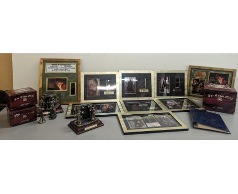 A quantity of framed movie film cells to include Lord of the Rings, Terminator, and The Matrix, together with three boxed Tud