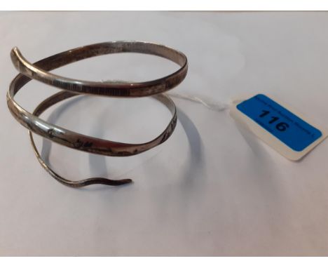 A 20th century Niello white metal bangle in the form of a snake, 34.5gLocation: 