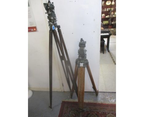Two Hilger &amp; Watts theodolites cased and with wooden tripod stands 