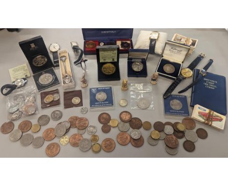 A mixed lot to include British and foreign coinage, commemorative Isle of Man coinage, and others, together with mixed wristw
