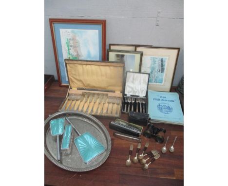 A mixed lot to include silver plated cutlery, enamel dressing table set, framed pictures, a Hohner harmonica and other itemsL