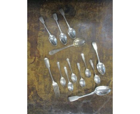 A selection of Georgian, Victorian and later silver spoons and a fork, mixed dates and makers, total weight 298.2gLocation: C