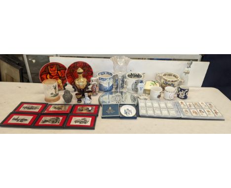 A mixed lot to include commemorative mugs and shaving cups, decanter and centrepiece, golf related tankard, Carlton ware and 