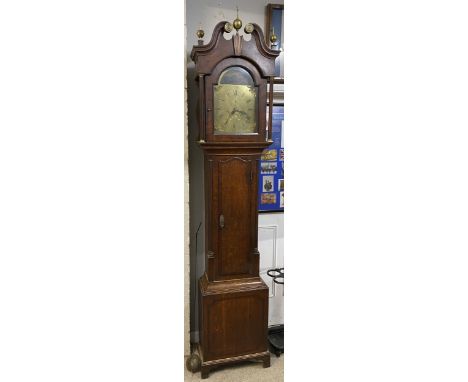 A George III oak cased longcase clock, the arched top brass dial having Roman numerals with subsidiary seconds and date dials