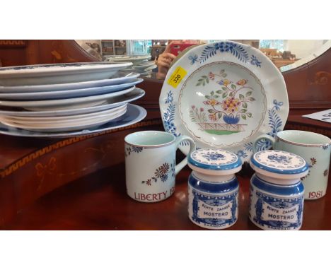Two 1981 Liberty mugs, decorative plates, two small Delft storage jars and a hand painted Calyx ware dish, together with a Vi
