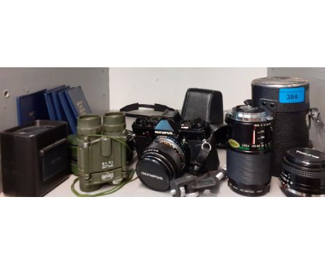 Six decimal coin sets, vintage cameras to include an Olympus OMI camera, together with small binoculars, matchboxes and a Sch