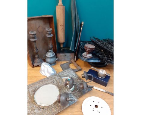 A miscellaneous lot to include 'O' gauge track, an ebonised stand, a Mappin & Webb silver plated tea strainer, a vintage wood